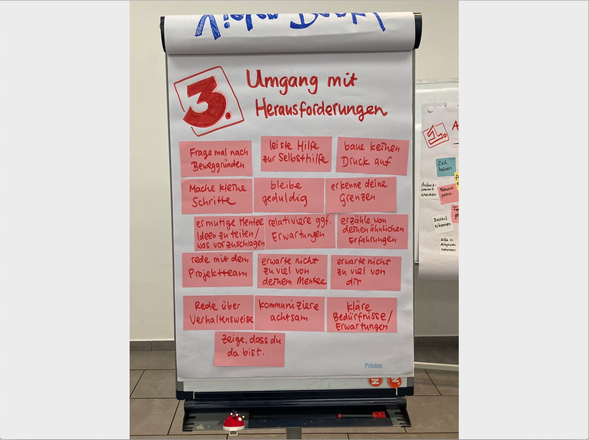 Whiteboard zum Thema Umgang mit Herausforderungen